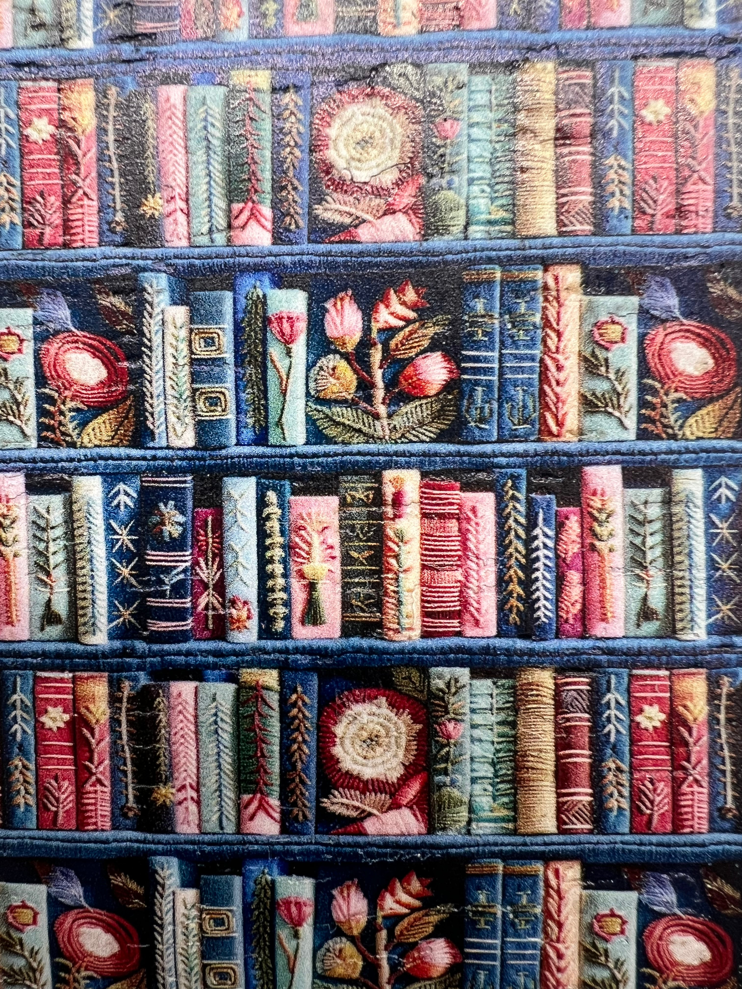 Patterned fabric with book design in various colors