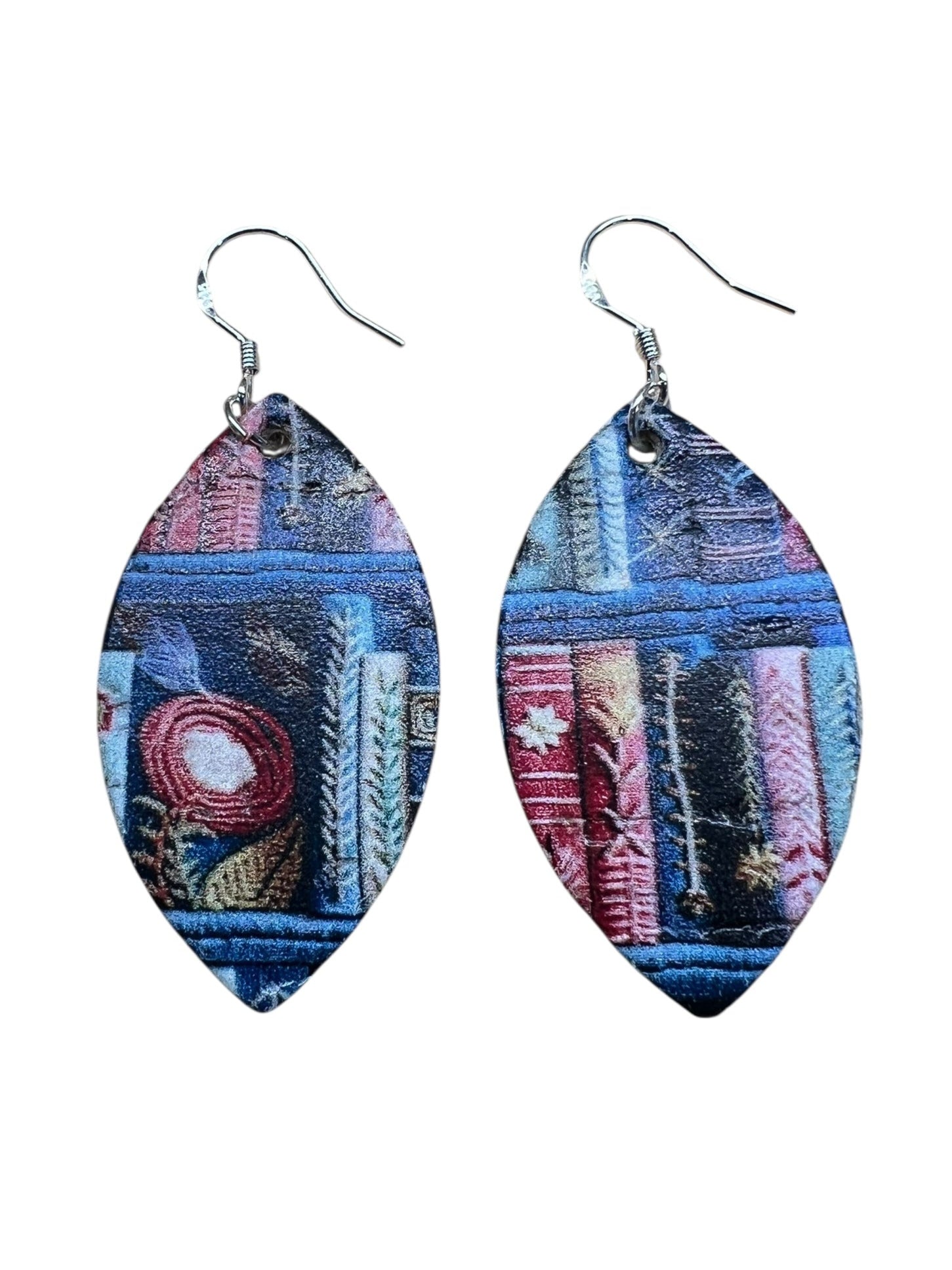 Pair of earrings with a colorful abstract design on a white background