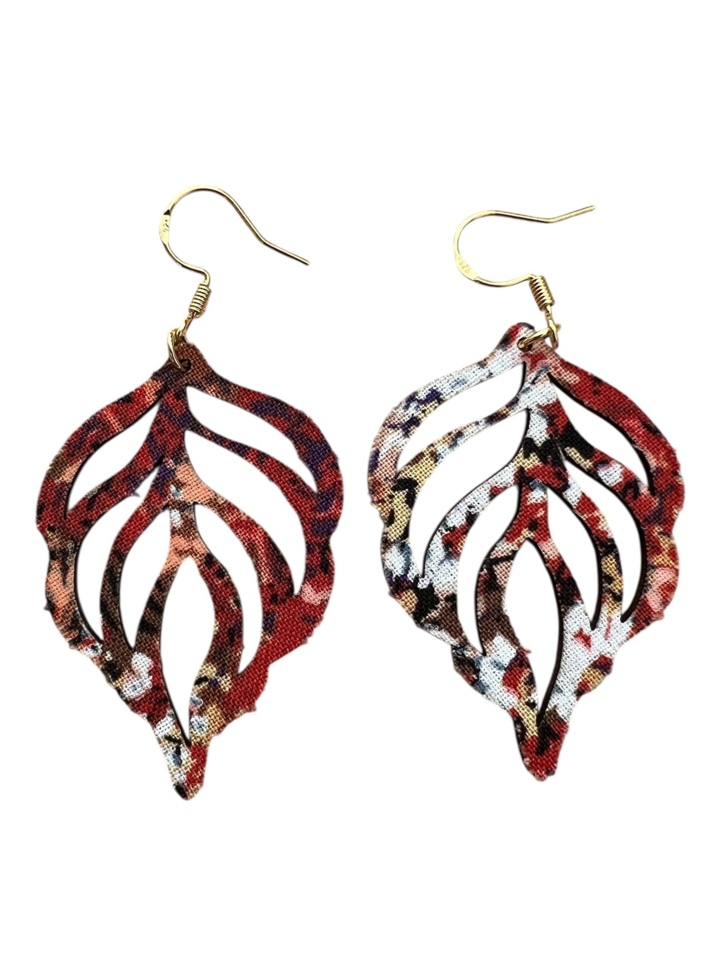Pair of earrings with leaf-like design in red, white, and gold on a white background