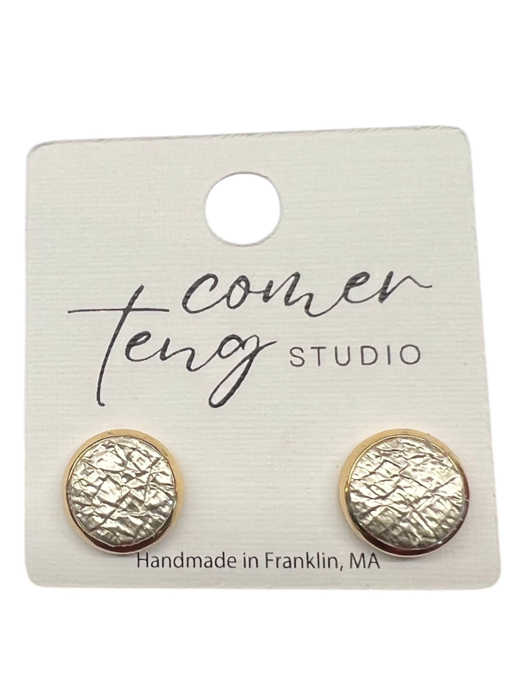 Silver textured earrings on a Comer Teng Studio card with 'Handmade in Franklin, MA' text.