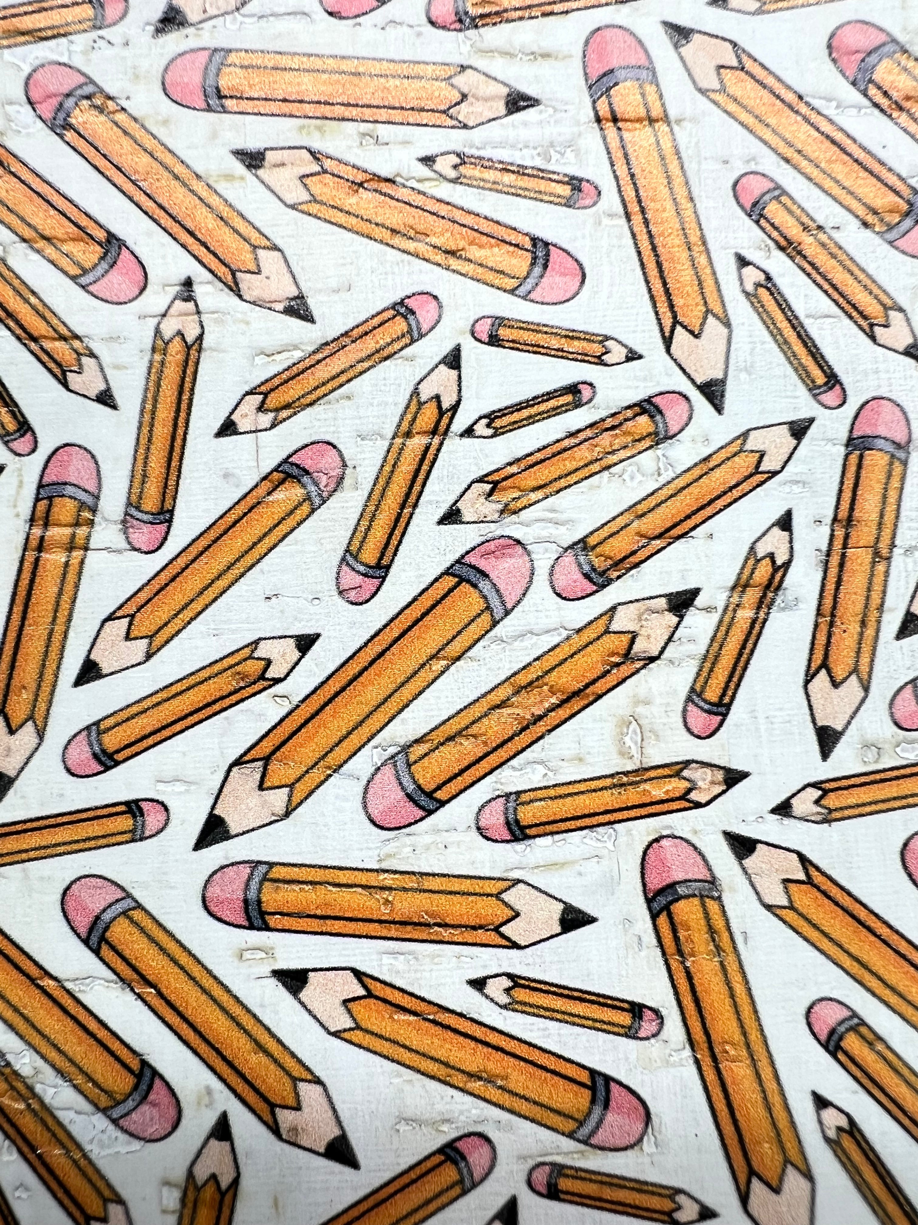 Pattern of pencils on a textured background