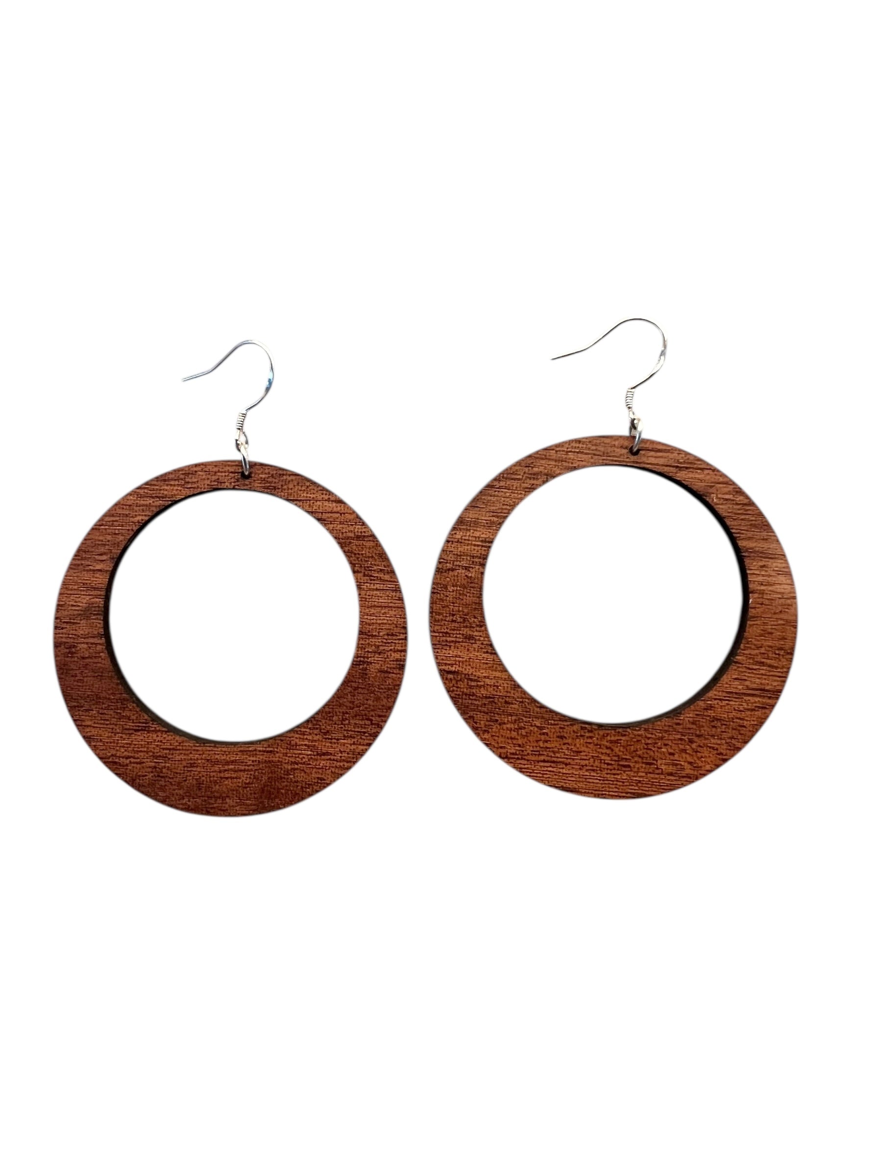Wooden hoop earrings on a white background