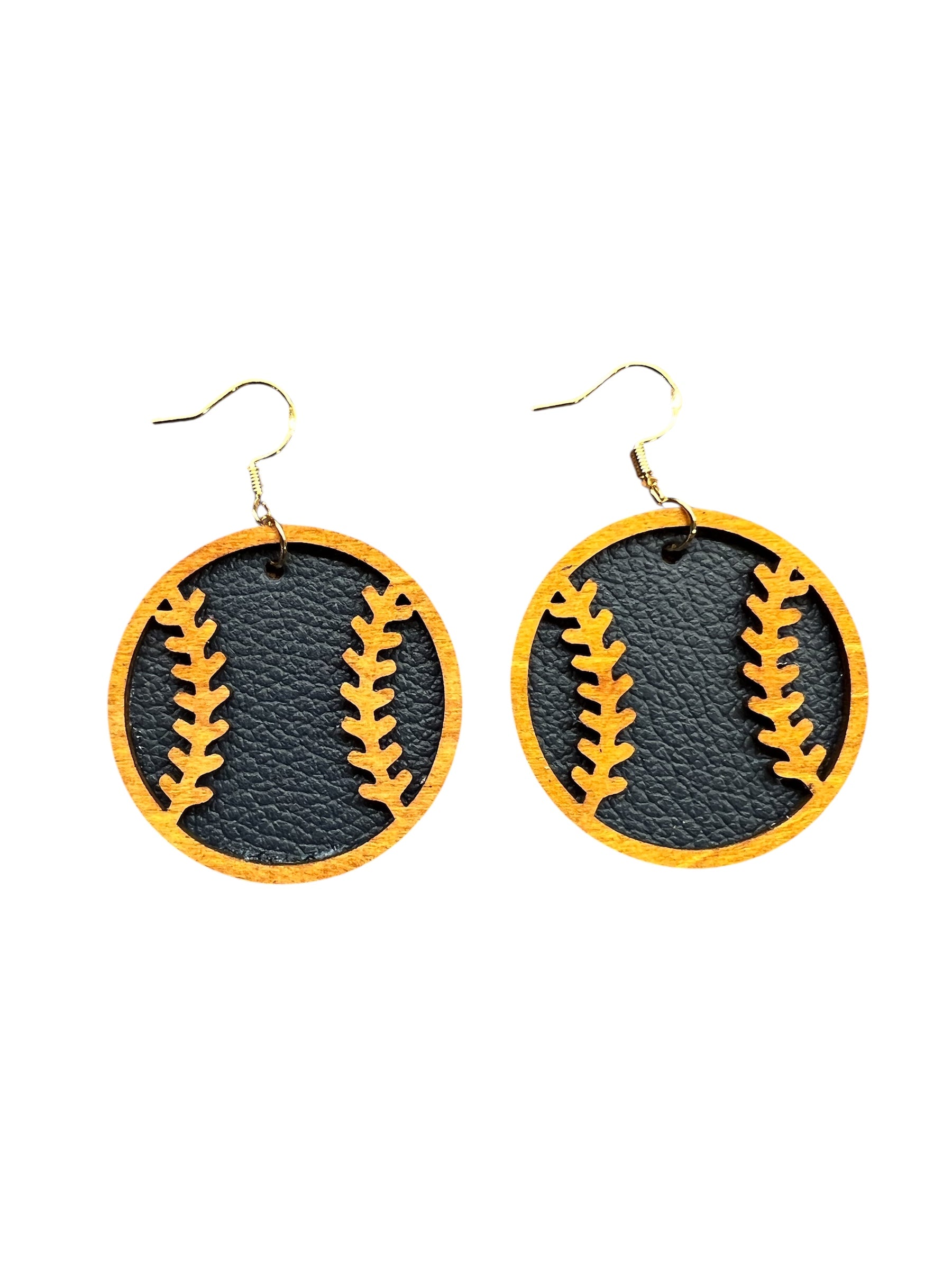 Black and yellow earrings shaped like baseballs on a white background