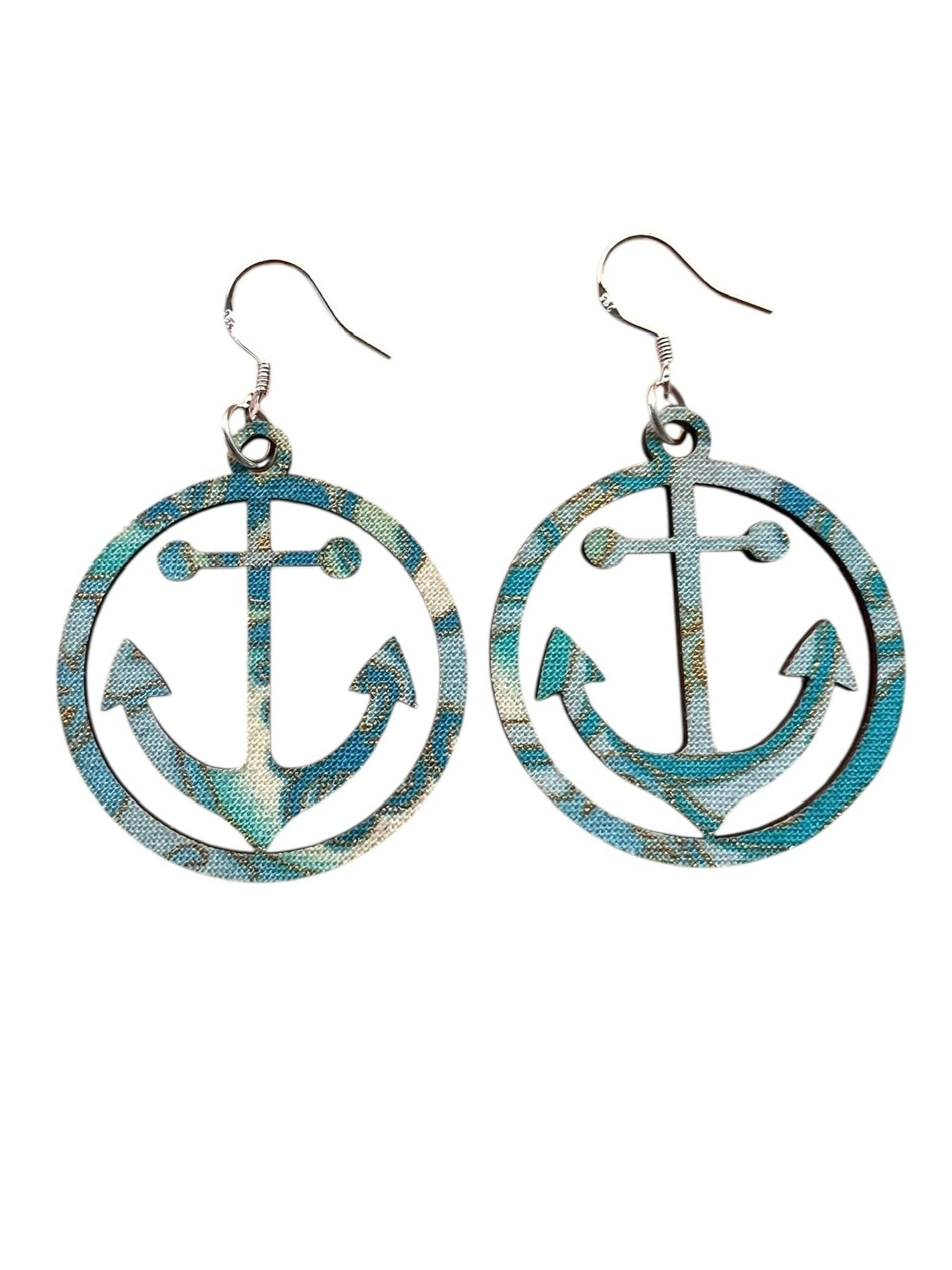 Anchor-shaped earrings on a white background