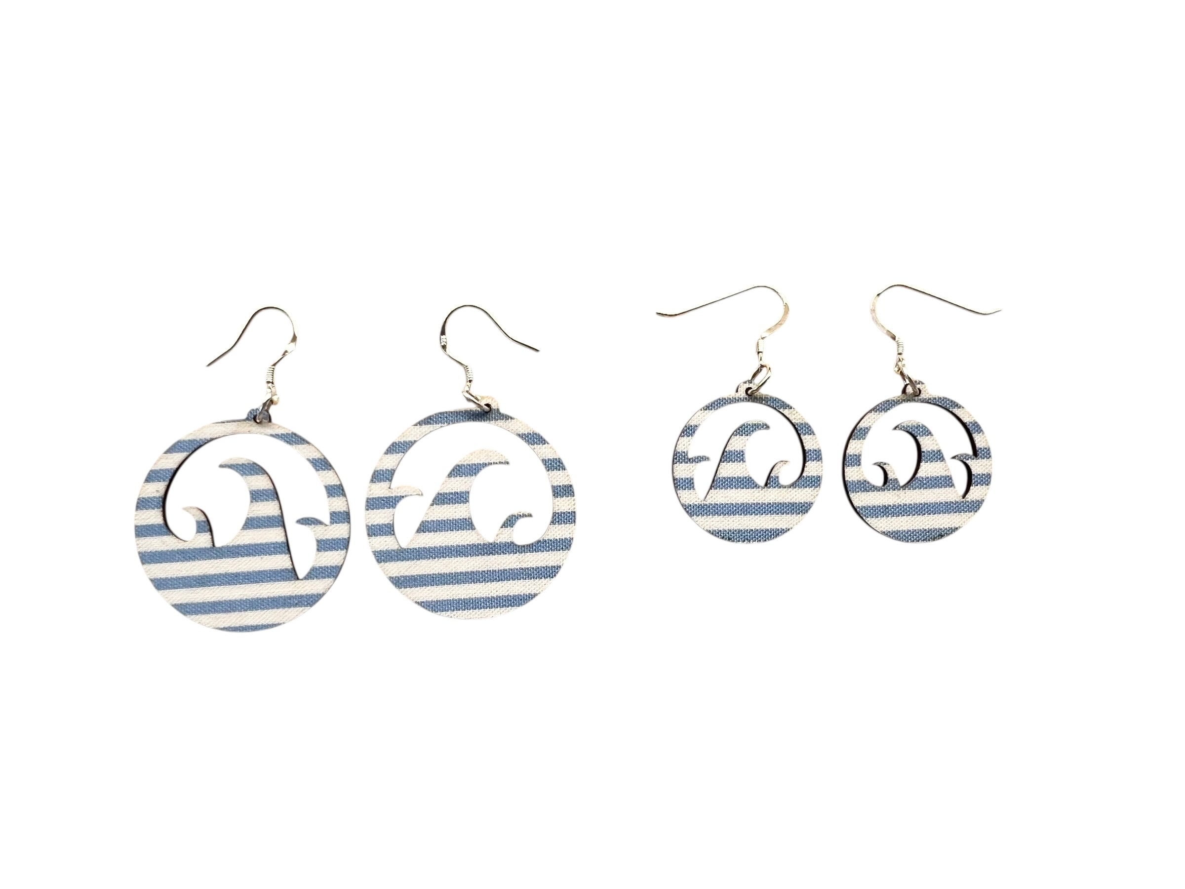 Pair of earrings with blue and white striped design on a white background
