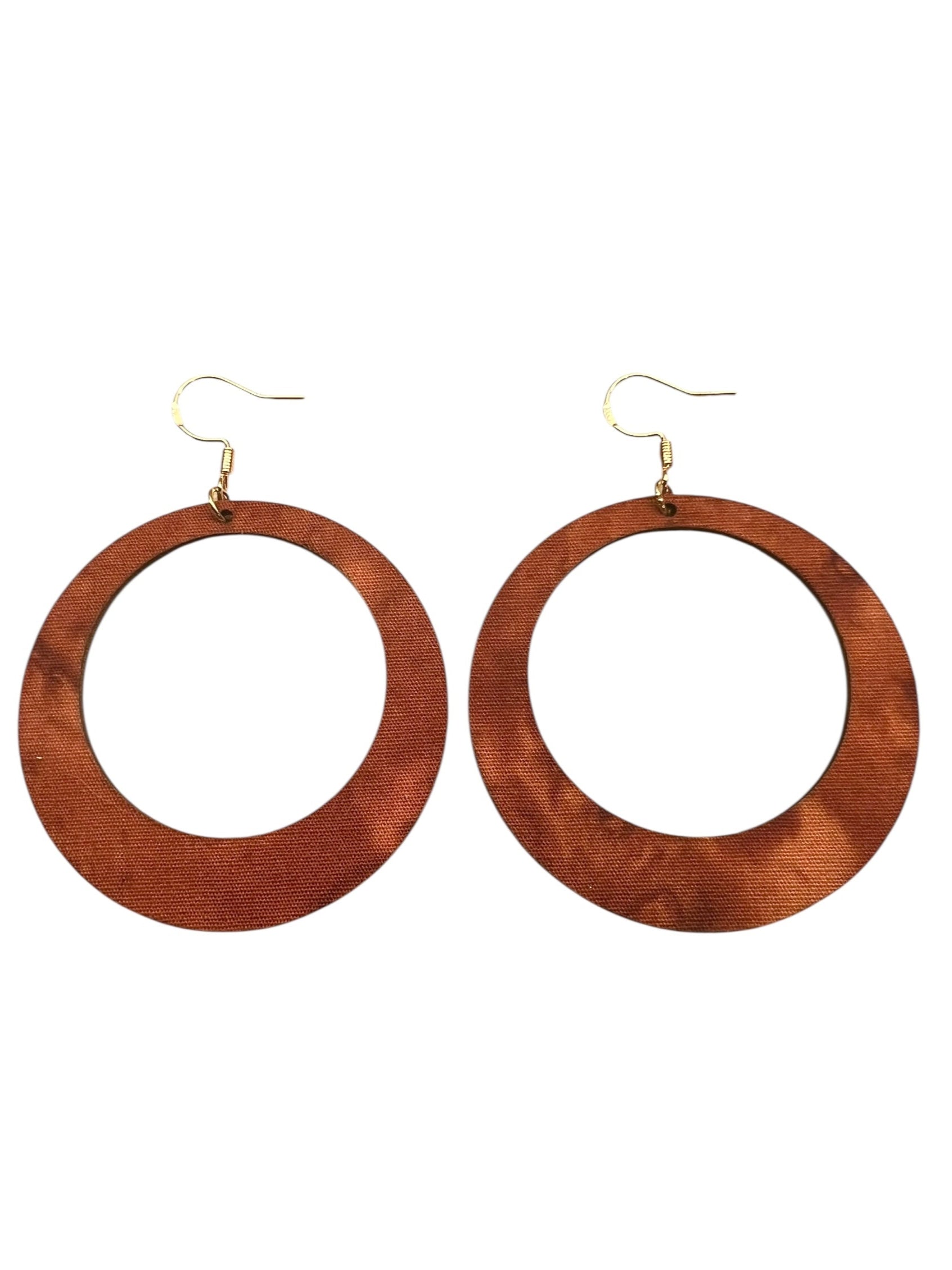 Wooden hoop earrings on a white background