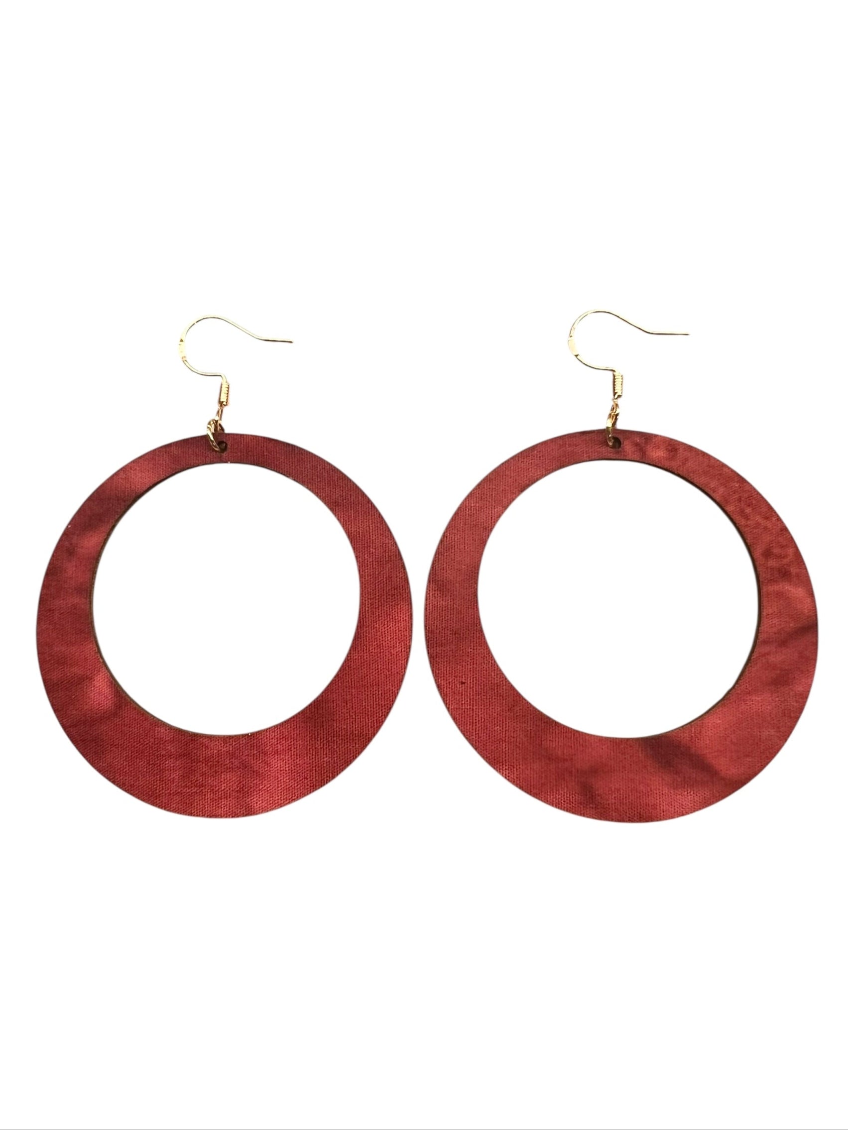 Wooden hoop earrings on a white background