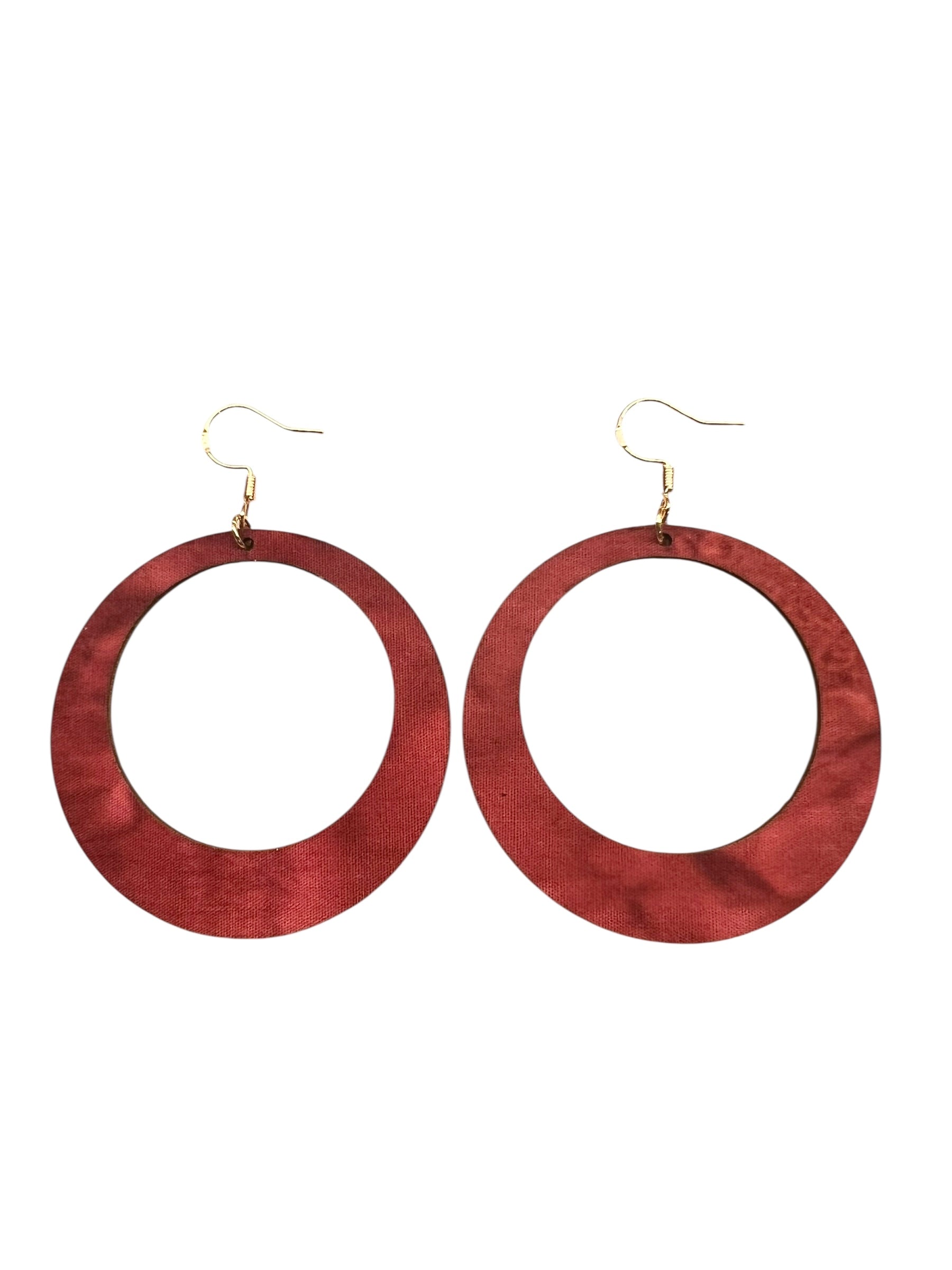 Wooden hoop earrings on a white background