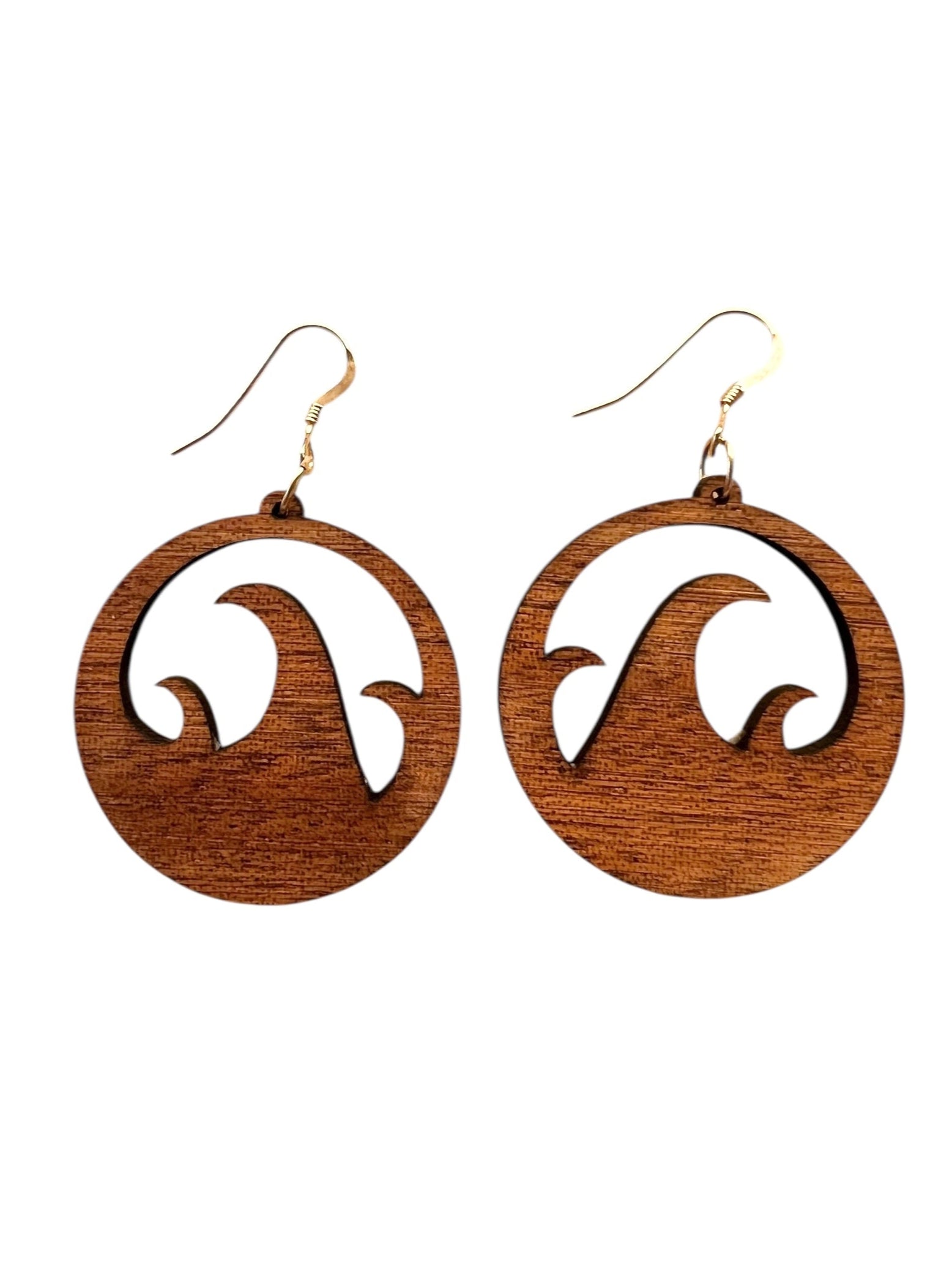 Wooden earrings with wave design on a white background