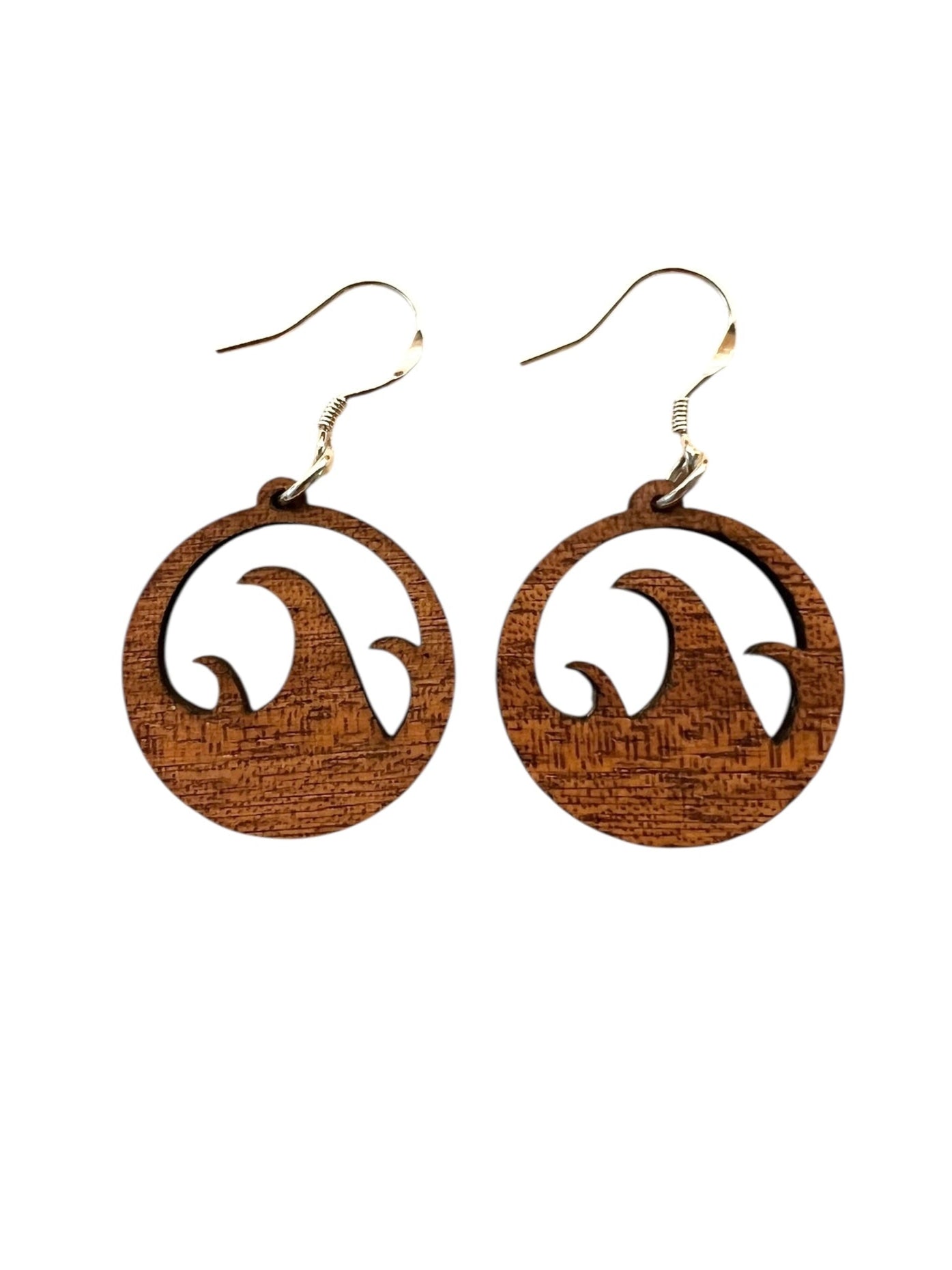 Wooden earrings with circular design on a white background