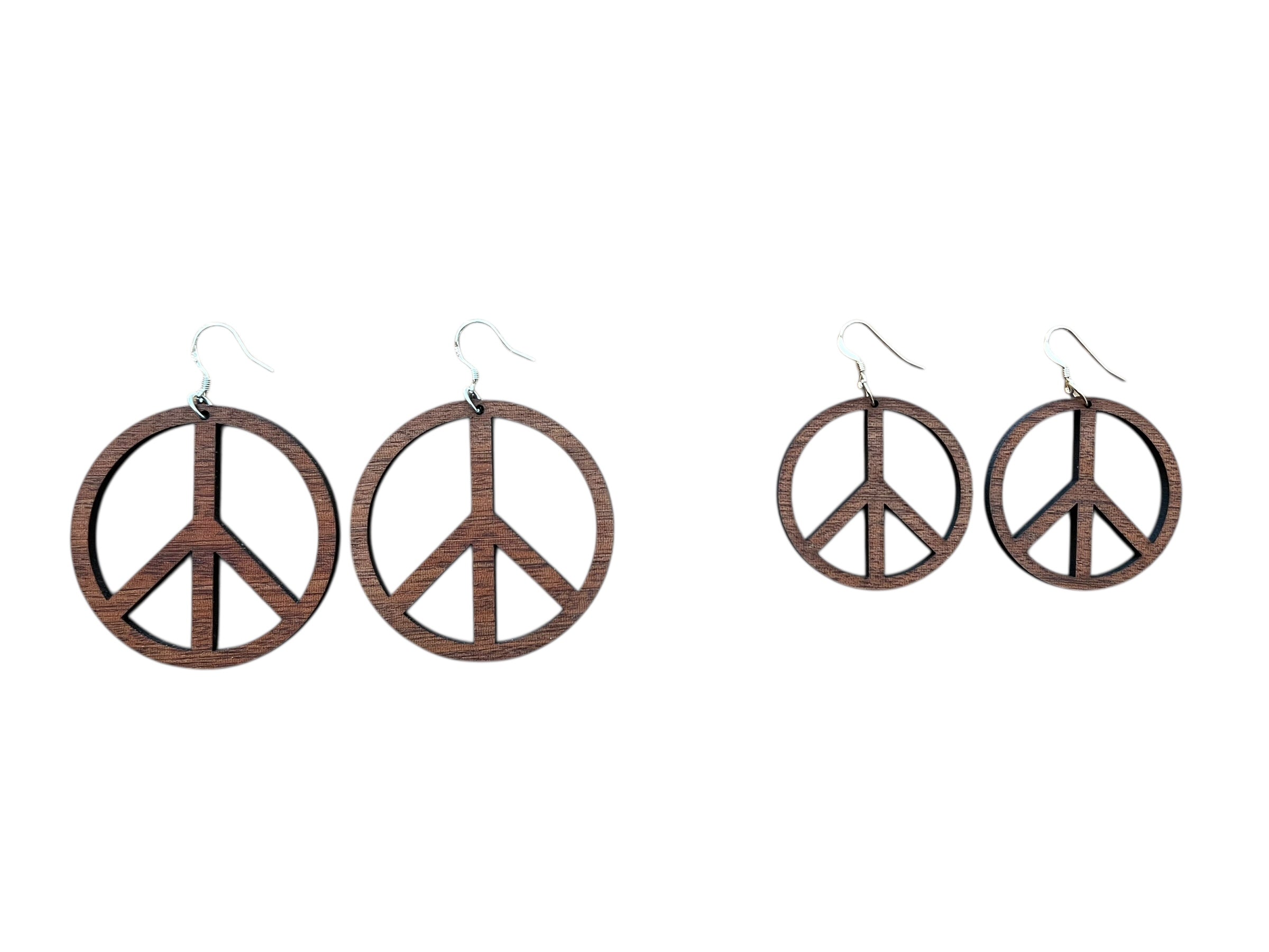 Peace sign earrings on a white background