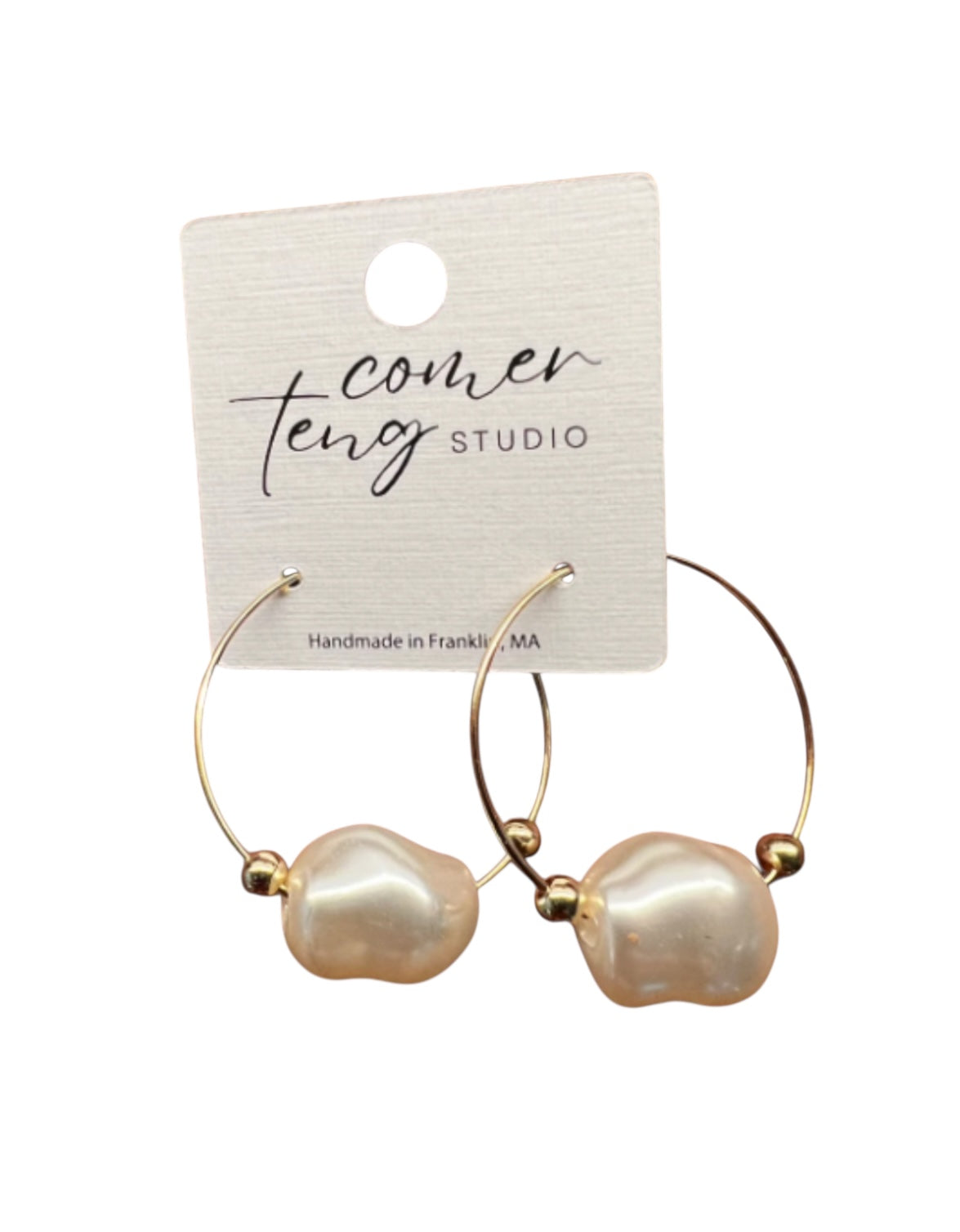 Gold hoop earrings with pearl accents on a 'cover teng studio' branded card.