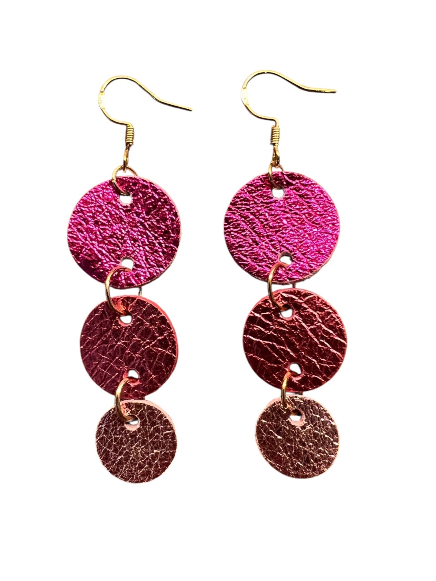 Pair of pink and red layered earrings on a white background
