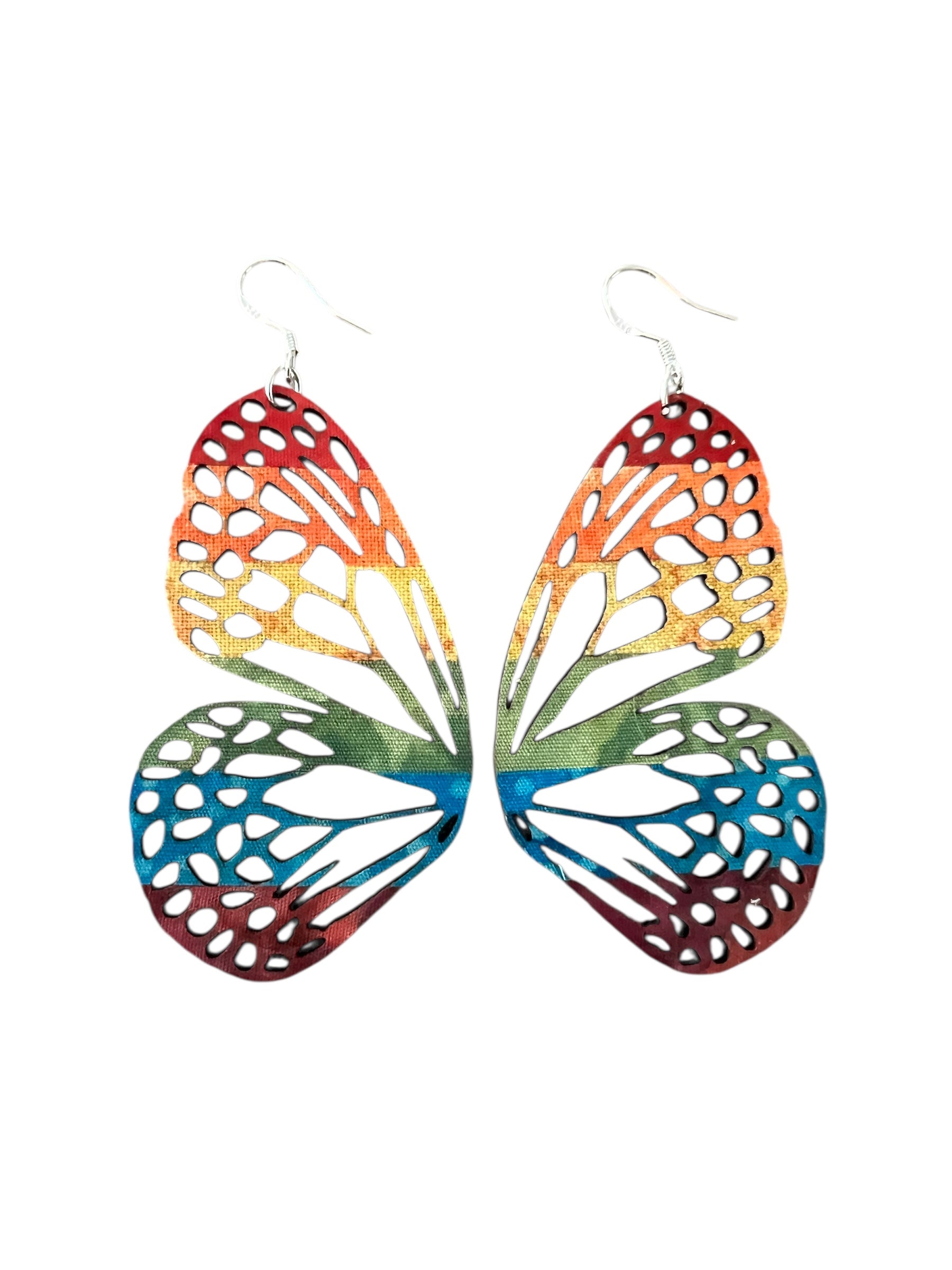 Colorful butterfly-shaped earrings on a white background