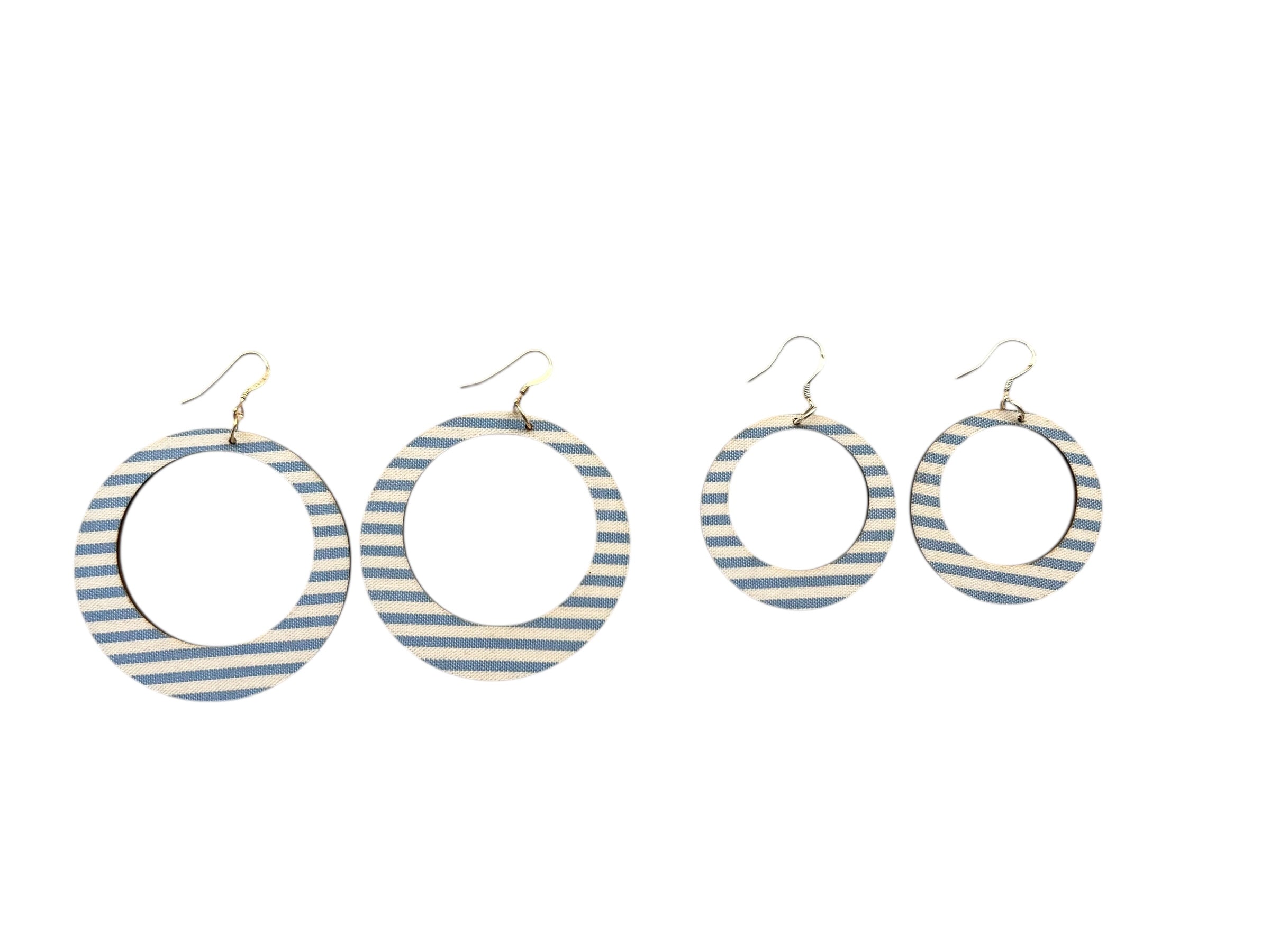 Set of four striped earrings on a white background