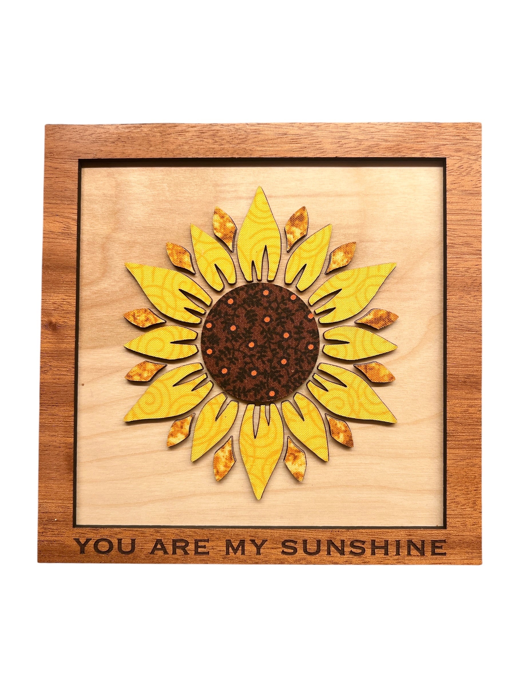 Wooden plaque with sunflower design and 'You Are My Sunshine' text on a white background